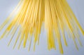 Uncooked yellow spaghetti