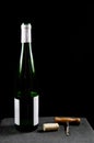 Uncorked wine bottle with utensiles Royalty Free Stock Photo