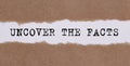 Uncover The Facts word written behind torn paper