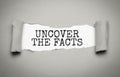 Uncover the facts written on torn paper. Concept