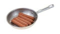 Uncured beef hot dogs in a frying pan Royalty Free Stock Photo