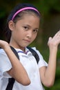 Undecided Filipina Girl Student With Books Royalty Free Stock Photo