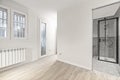 Undecorated room with dark flooring, a blank canvas for ambitious design projects Royalty Free Stock Photo