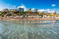 Undefinable people relaxing on Coral Bay Beach, one of the most famous beach Royalty Free Stock Photo