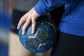 Undefined hands holding a ball prior to the Greek Women Cup Final handball game Arta vs Nea Ionia