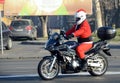Undefined Santa delivering humanitarian aid in form of gifts to disabled children