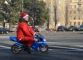 Undefined Santa delivering humanitarian aid in form of gifts to disabled children