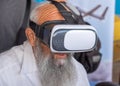 Undefined religious jewish person wear VR headset glasses