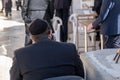Undefined ultra-orthodox jewish person prays next to Western Wall in Jerusalem
