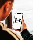 Under armour on iphone in hand realistic texture