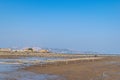 Under the blue sky, the lines and textures of bamboo rafts and ropes in the seaweed farm on the beach are very neat Royalty Free Stock Photo