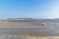 Under the blue sky, the lines and textures of bamboo rafts and ropes in the seaweed farm on the beach are very neat Royalty Free Stock Photo