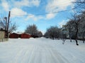 Under the blue sky is snowbound road