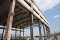 Abandoned wharf buildings by the river Royalty Free Stock Photo