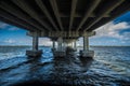 Under bridge with ocean water Royalty Free Stock Photo