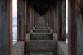 Under the bridge walkway from the beach to the sea