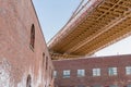 Under Brooklyn Bridge outside exterior outdoors in NYC New York City, blue sky Royalty Free Stock Photo