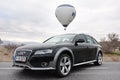 Under the Cappadocia balloons with the new model Audi A4 Allroad Royalty Free Stock Photo