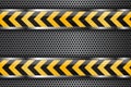 Under construction background. Metal perforated texture with black yellow glass stripes Royalty Free Stock Photo