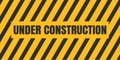 under construction background. under construction sign background with black and yellow stripes. Royalty Free Stock Photo