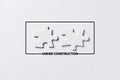 Under construction message with separated puzzle pieces. Website construction, maintenance Royalty Free Stock Photo