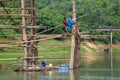 Under construction old wooden bridge Mon in Sangkhla Buri