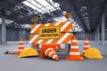 Under construction sign with barrier and cones