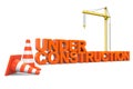 Under construction sign with Hoisting Crane