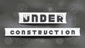 Under construction signage paper cut style on chalkboard background
