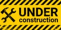 Under construction site banner sign vector black and yellow diagonal stripes under construction, hammer and wrench