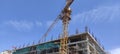 Under Construction building with Crane and blue sky background Royalty Free Stock Photo