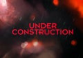 Under construction title, grunge style with grain and partial blur. Black and red color scheme