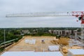 Under construction tower cranes over house aerial view Royalty Free Stock Photo