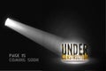 Under construction warning in searchlight on black background. Web site banner with 3d text on scene Royalty Free Stock Photo