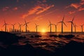 Under construction wind turbines create dramatic silhouettes in the offshore expanse