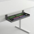 Under Desk Cable Management Tray with Red Green and Blue Wires in Studio Royalty Free Stock Photo
