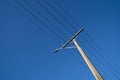 Under electric pole with clear blue sky at Oamaru, New Zealand Royalty Free Stock Photo