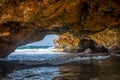 Under the Natural bridge formation in Aruba`s north coast Royalty Free Stock Photo