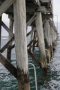 Under neith Port Noarlunga Jetty. Beams and Structures.