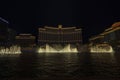 Under the night starlit sky the enchanting fountains of the Bellagio casino hotel grace the Strip in Las Vegas. Royalty Free Stock Photo