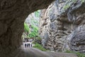 Under overhanging cliffs in narrow Chegemsky gorge near Chegem waterfalls