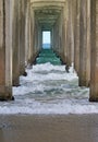 Under the pier at Scripps Beach, San Diego Royalty Free Stock Photo