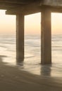 Under the Pier at sunrise or sunset