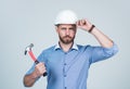 under protection. mature bearded businessman in helmet. confident guy hold hammer. Royalty Free Stock Photo