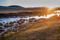 The pasture under the radiance of the setting sun