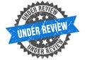 Under review stamp. under review grunge round sign. Royalty Free Stock Photo