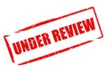 Under review stamp Royalty Free Stock Photo