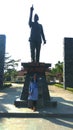 under the scorching heat of the sun, a photo together with a statue of an Indonesian heroMajor General of TNI prof.Dr.Moestopo
