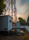 Under the signal transmitting tower in the afternoon