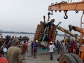 Under supervision of higher police official immersion of Maa Kali going on , it is heading towards the holy Ganges by crane.